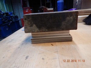 A stack of home-made thank you notes under a solid steel brick.  Watch the glue dry!