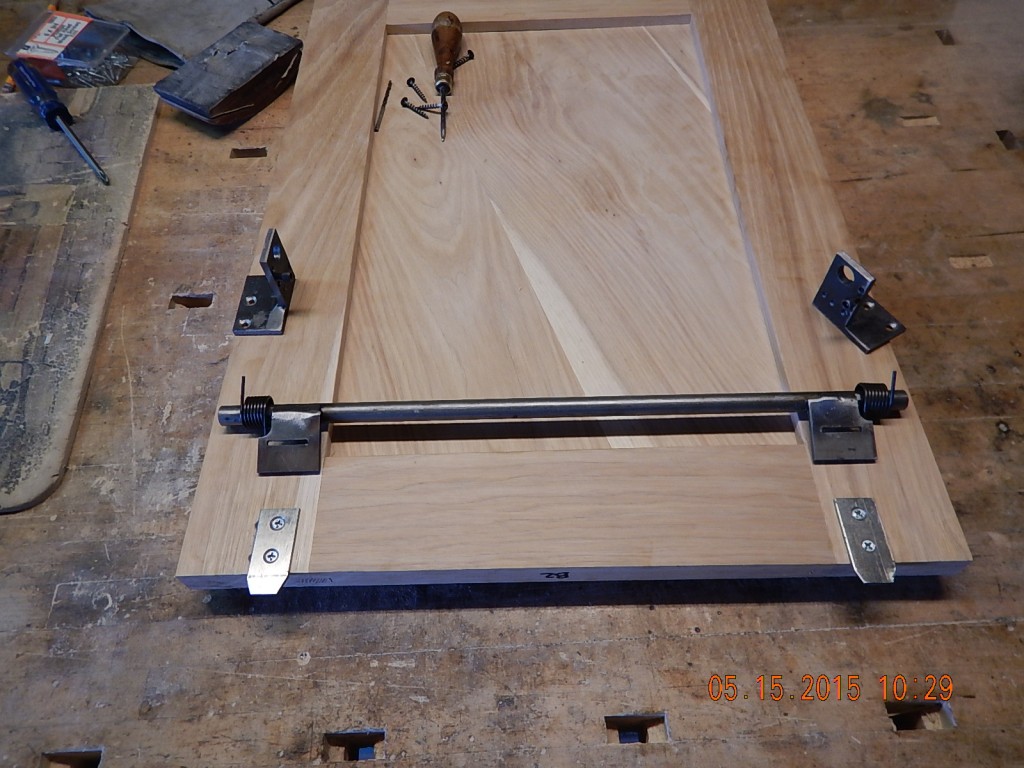 The quick-release spring-loaded  drop-down hinge for cabinet B2