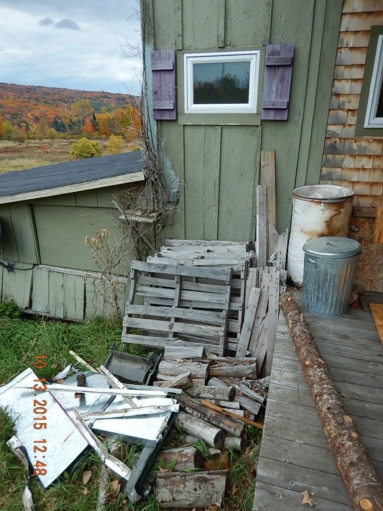 In order to replace this undersized window, I had to move the oversized piles of crap first. 