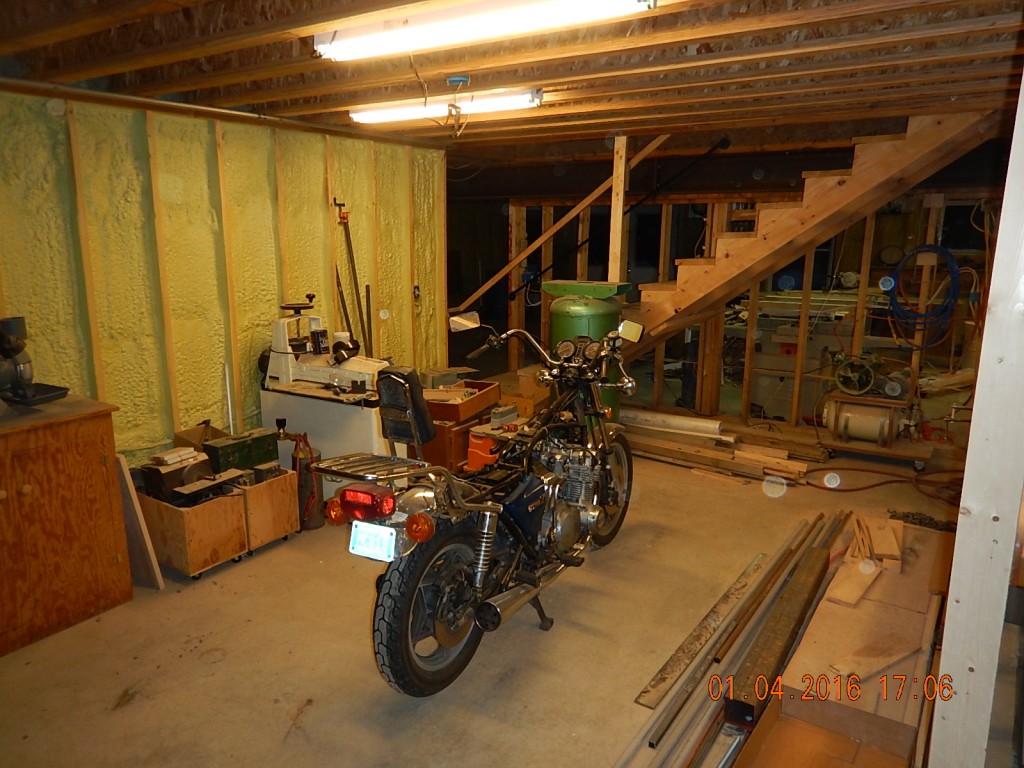 I set up space and lighting for re-building the motorcycle. It makes a big difference, compared to doing it 'in the way' 
