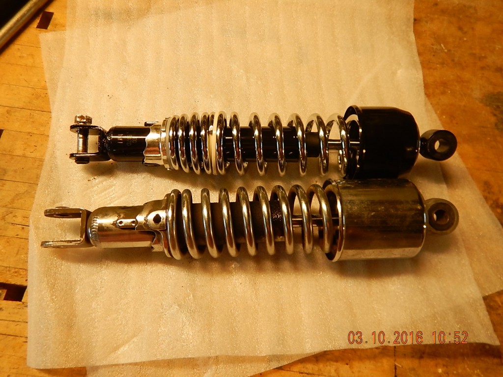 New and old shock absorbers.  You get what you pay for, but it'll do until I understand the tradeoffs a little better.