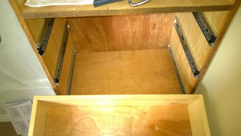 The case of the incredible shrinking wall cabinet. The drawers are 5" too wide!