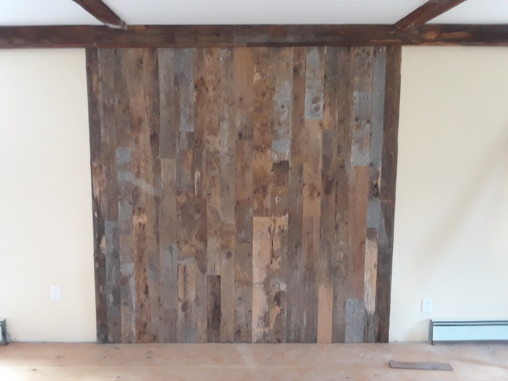Meanwhile, back at the green house, I used up a lot of the barn board off-cuts from the doors to hide some ugly plywood in the living room. No blood!