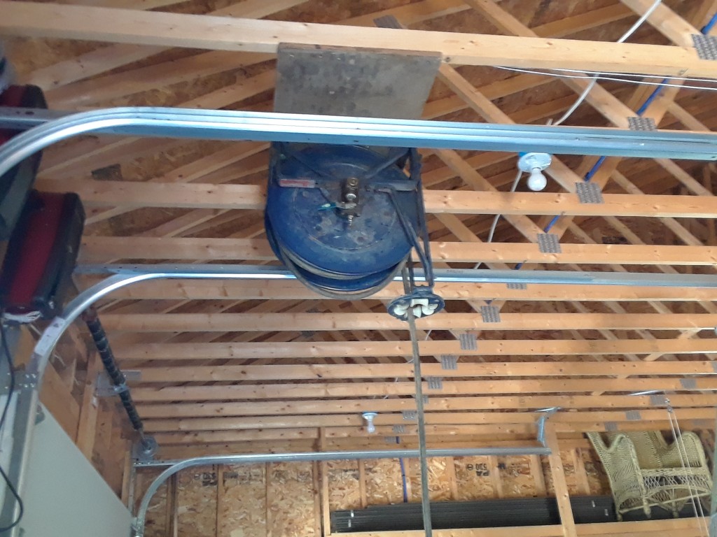 This retracting pneumatic hose coil was in the way all winter, and I finally decided to put it (twelve feet) up in the garage.  It has a MSRP of $455 but I got it at auction for $30 last summer (plus 2 O-rings to fix a leak).