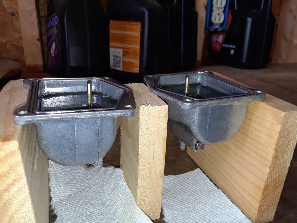 Repaired carburetor float bowls under test.  No leaks found!!