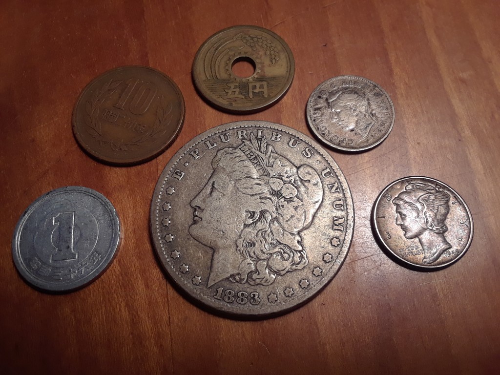 While setting up the cabinet in the basement, I found an envelope full of coins, worth about as much as I paid for the cabinet!
