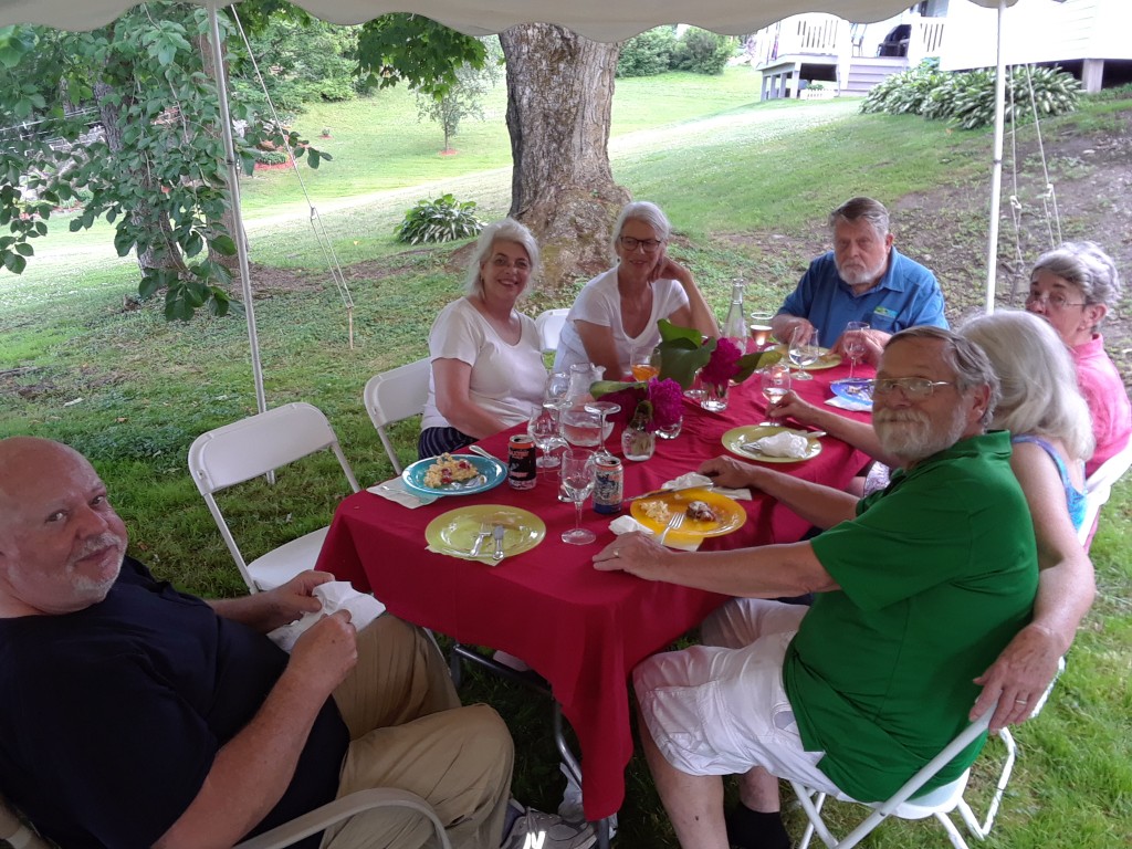 It seems to me that I went directly from being the oldest kid at the kids table at Thanksgiving dinners to being the youngest one at the Old Folks table at birthday parties. Clockwise, we've got Bill, Me, Mary, Lisa, Marshall, Charon, Edie, and Richard. Old farts one and all.