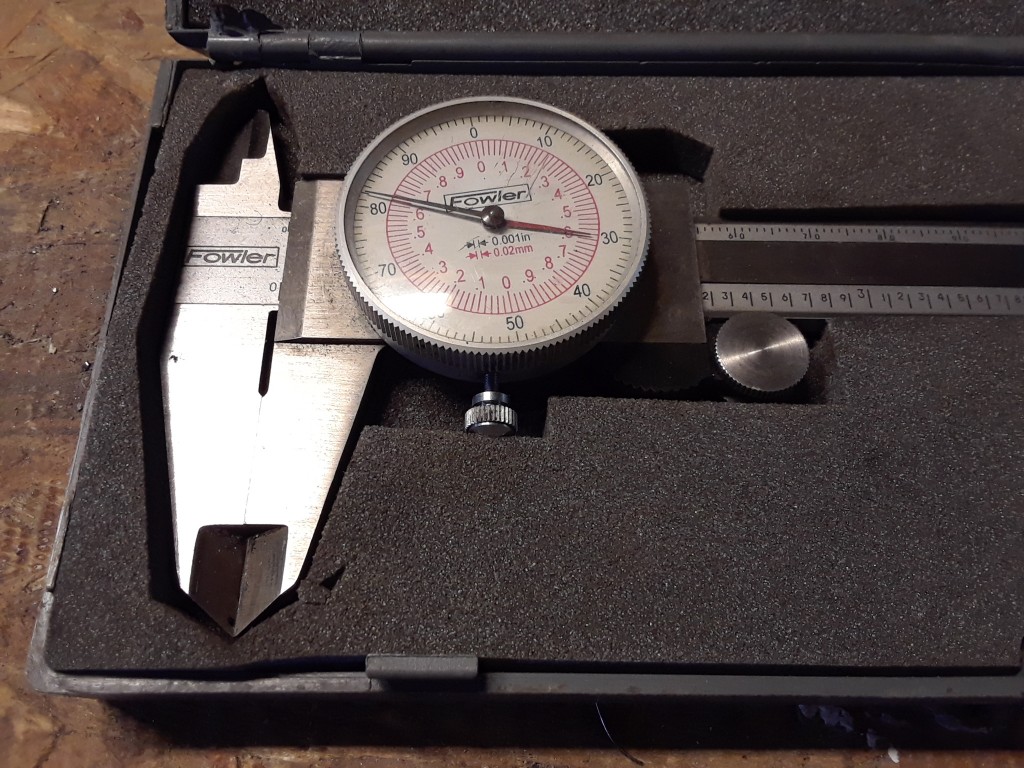 For $25, I snared this unusual two-handed micrometer. I'm not saying I'll ever need to simultaneously measure in inches and centimeters, but if I do, I'll be ready.