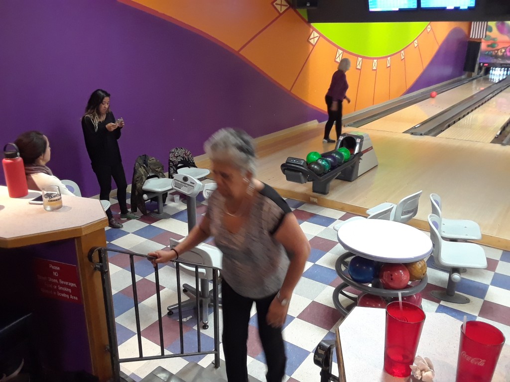 We went bowling to celebrate Suri's 11th birthday. Here, Mary rolls (yet) another gutter-ball en route to a 54.  My first roll was a strike, but it was all downhill from there, and I got a 91. Even Suri did better than that.